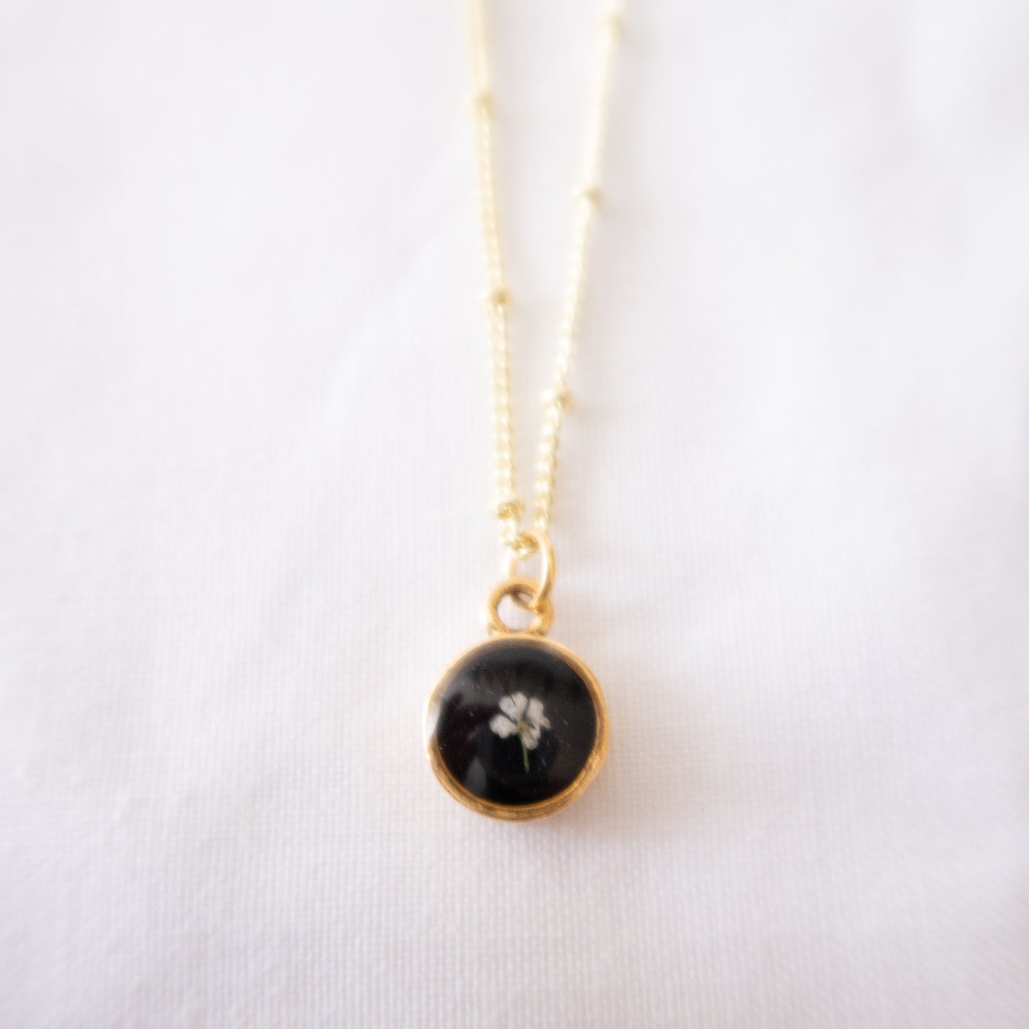 The Tiny Fleur Circle Pendant