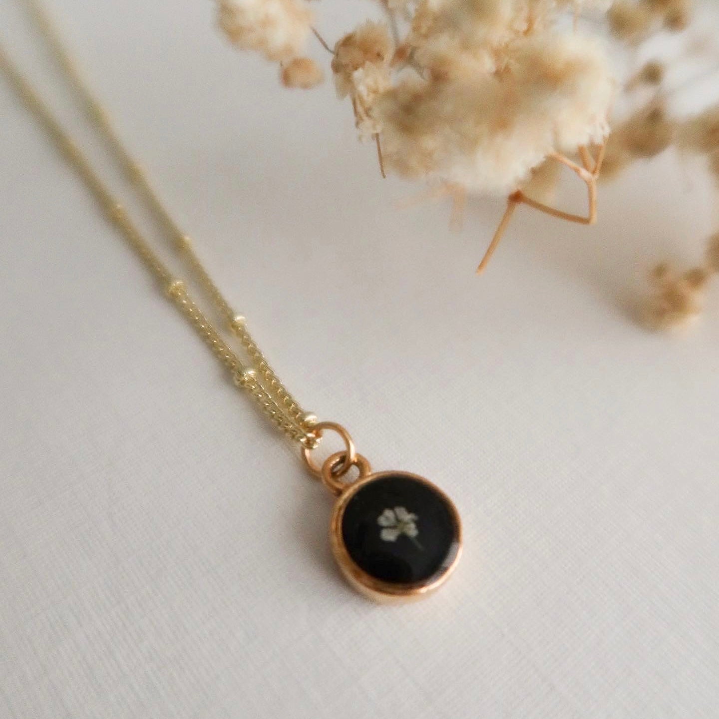 The Tiny Fleur Circle Pendant