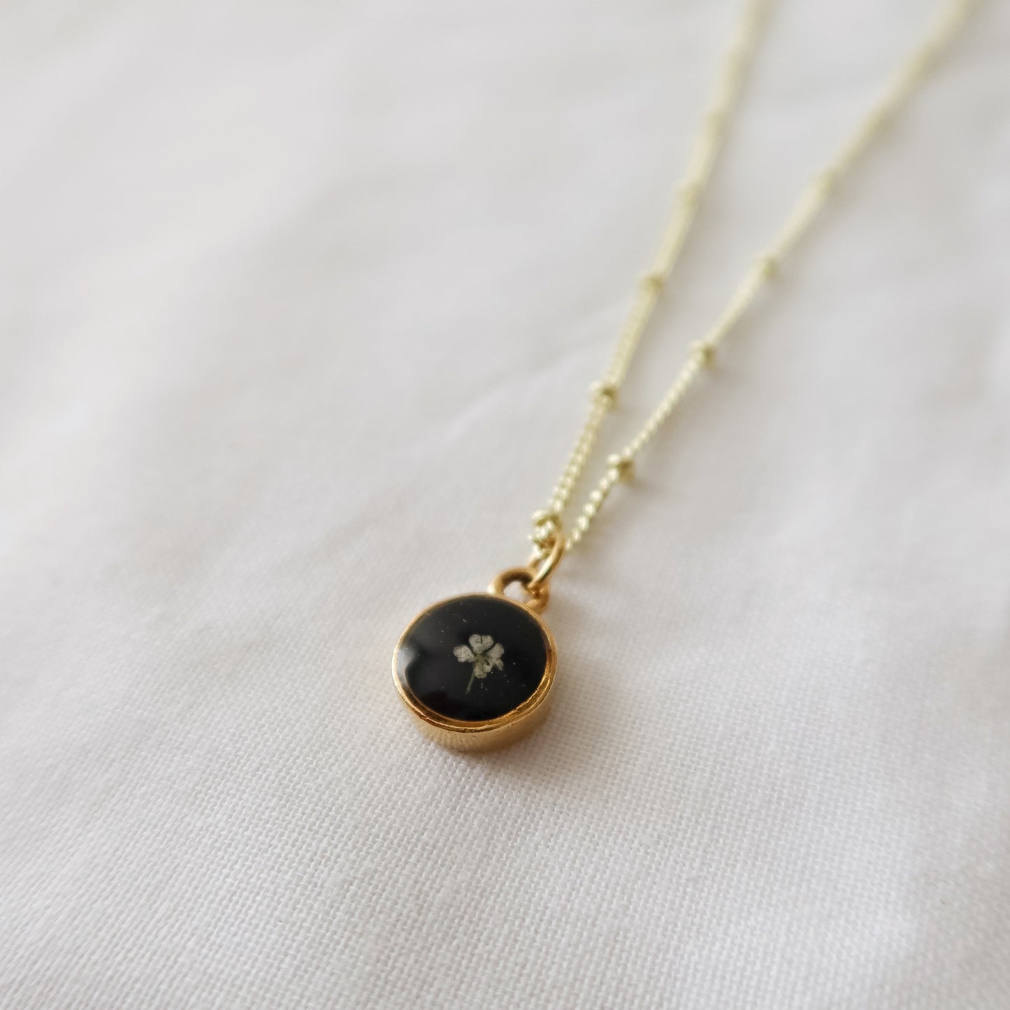 The Tiny Fleur Circle Pendant