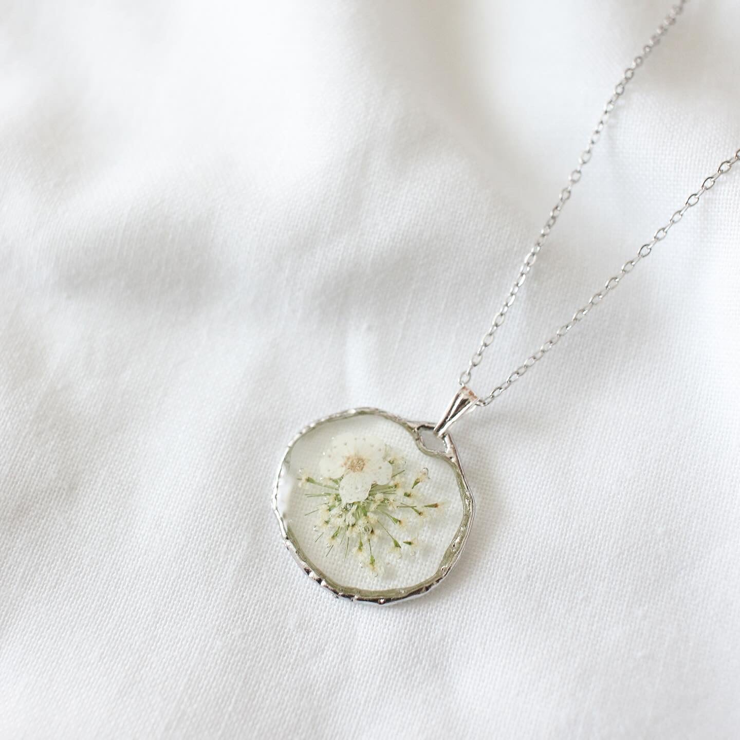 The Trouvaille White Narcissus Necklace in Silver
